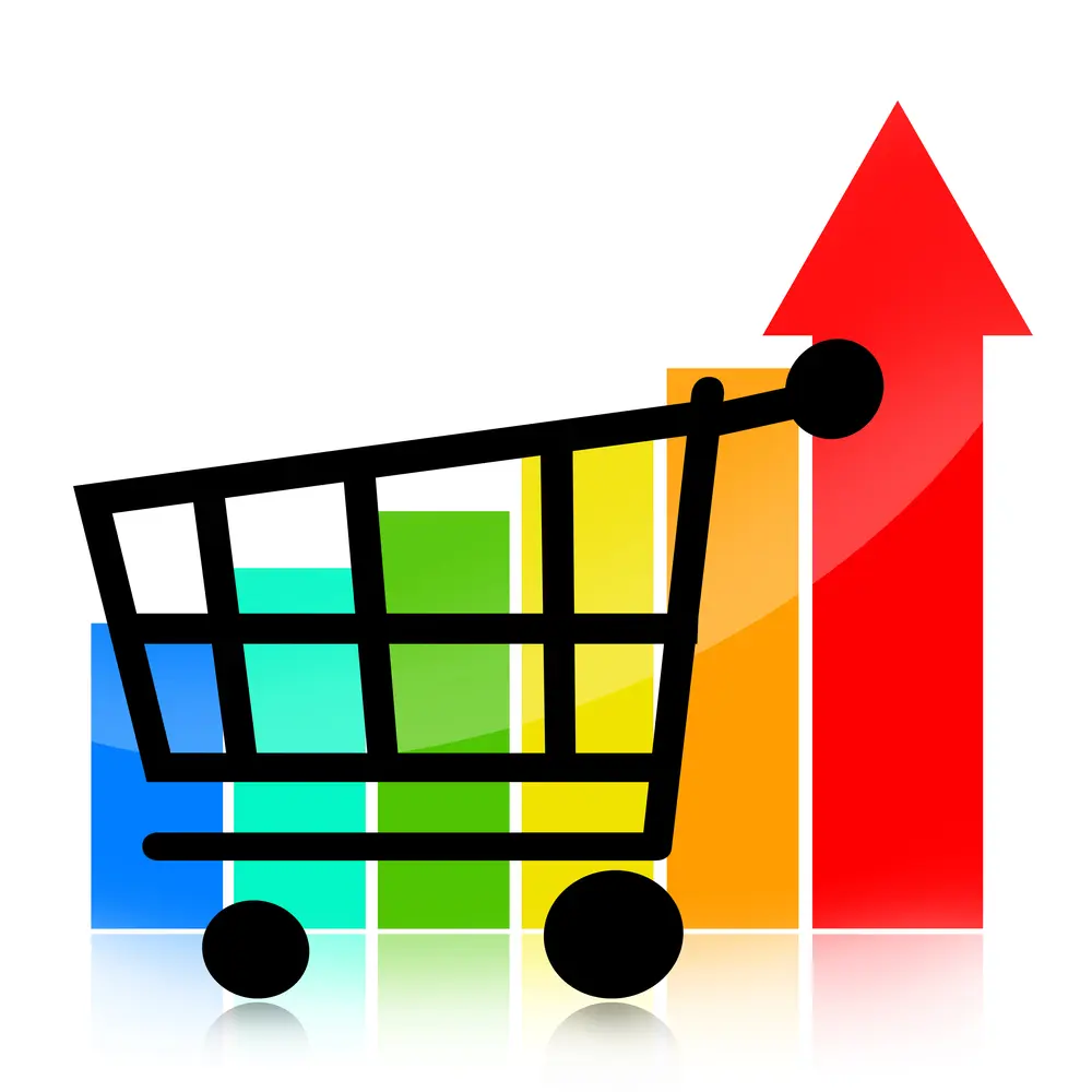 A black shopping cart in front of a multicolored bar chart.