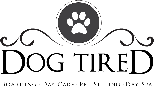 A black, grey, and white Dog Tired logo.