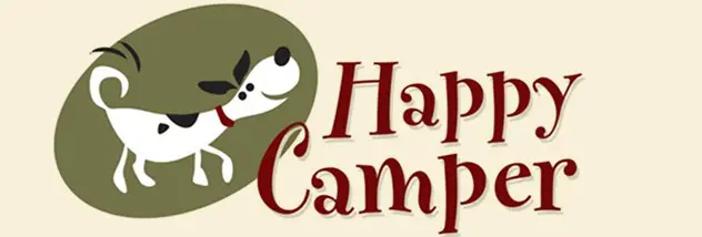 A beige, green, and red banner with a cartoon dog wagging its tail that reads, "Happy Camper."