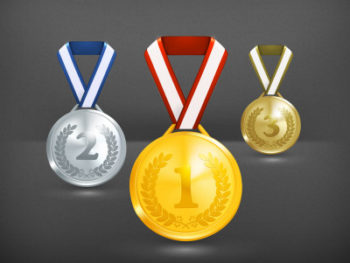 Three medals -- gold, silver, and bronze, with the numbers one, two, and three showcased on each one, respectively.